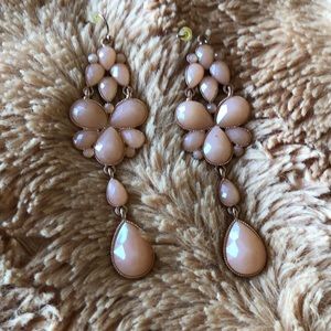 Dangle earrings. Beautiful peach color.